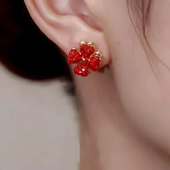 Close-up detail of the sparkling zircons and plating on the Rotating Flower Earrings