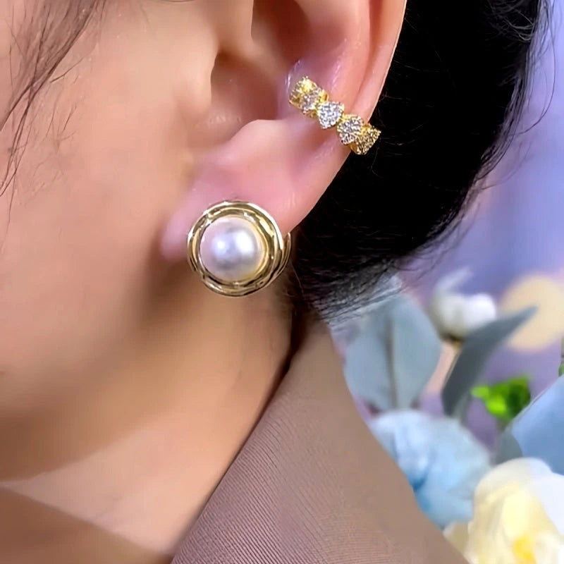 Close-up detail of the sparkling zircons and plating on the Round Pearl Earrings