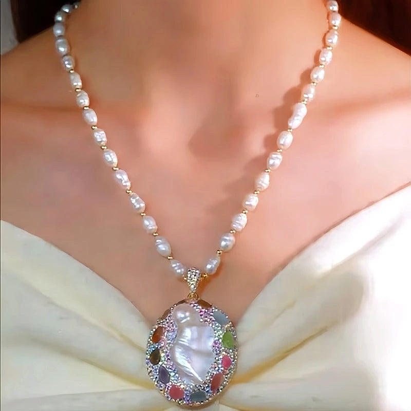 14K Gold-Plated Round Pearl Sweater Necklace worn to showcase its length and pendant detail