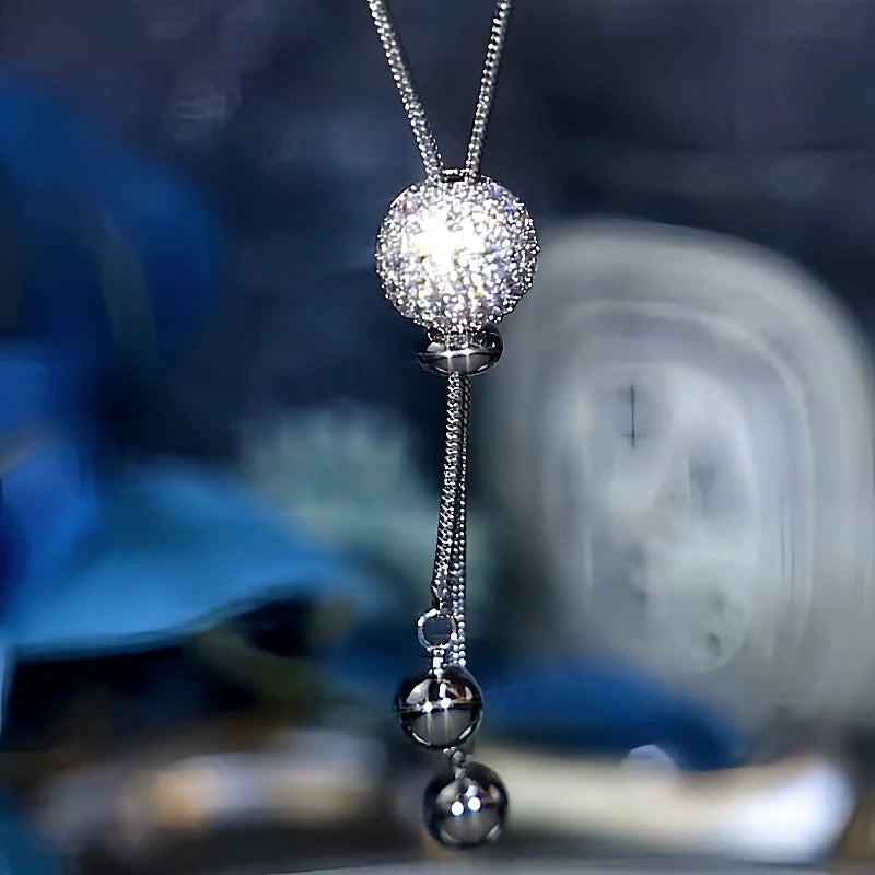 14K Gold-Plated Silver Ball Tassel Sweater Chain Necklace worn to showcase its length and pendant detail