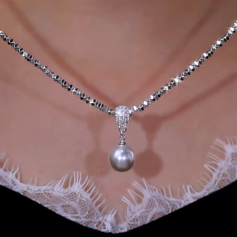 Close-up of the pendant and clasp on the Silver Pearl Necklace