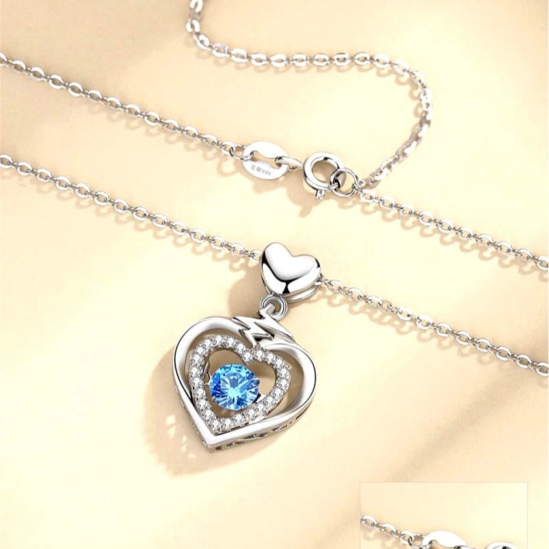 14K Gold-Plated Silver Zircon Blue Crystal Heart Necklace worn to showcase its length and pendant detail