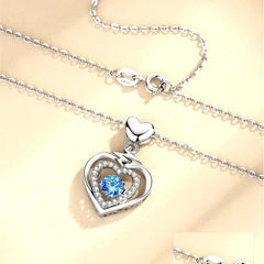 14K Gold-Plated Silver Zircon Blue Crystal Heart Necklace worn to showcase its length and pendant detail
