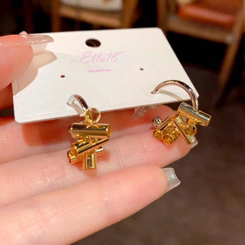 Angled view of the 14K Gold-Plated Simple C-Shaped Earrings