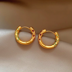 Angled view of the 14K Gold-Plated Small Hoop Earrings