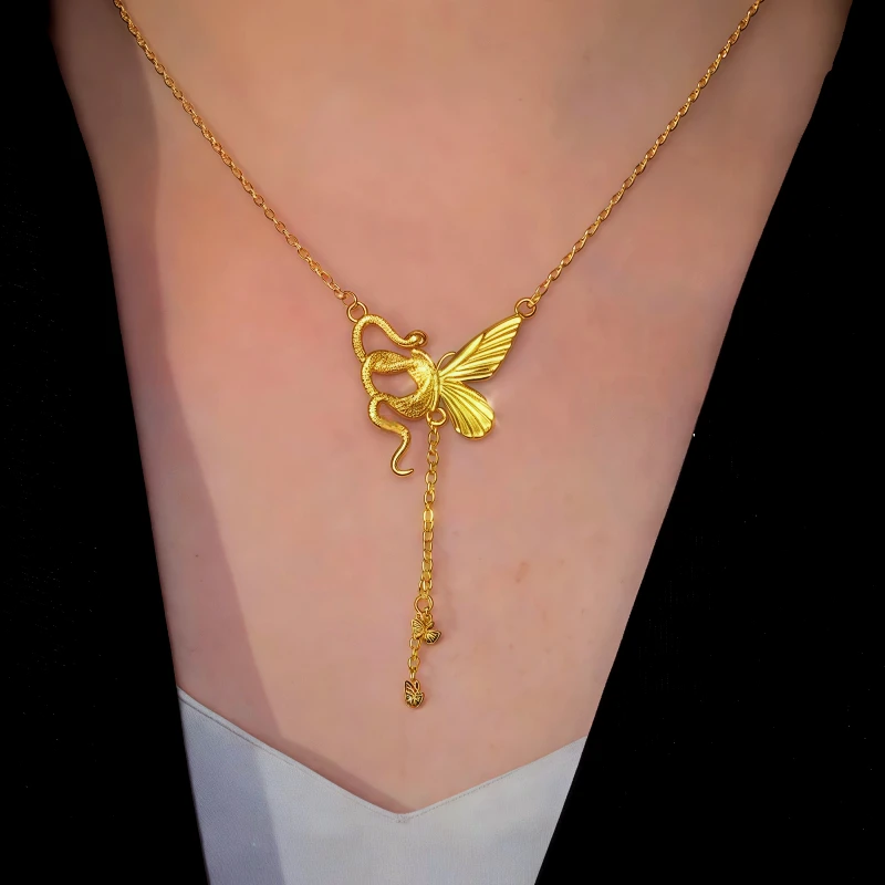 Close-up of the pendant and clasp on the Snake Tassel Necklace