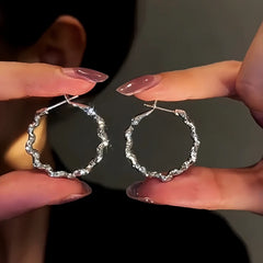 Close-up detail of the sparkling zircons and plating on the Diamond Hoop Earrings