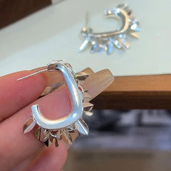 Angled view of the 14K Gold-Plated Sparkling Wheat Earrings