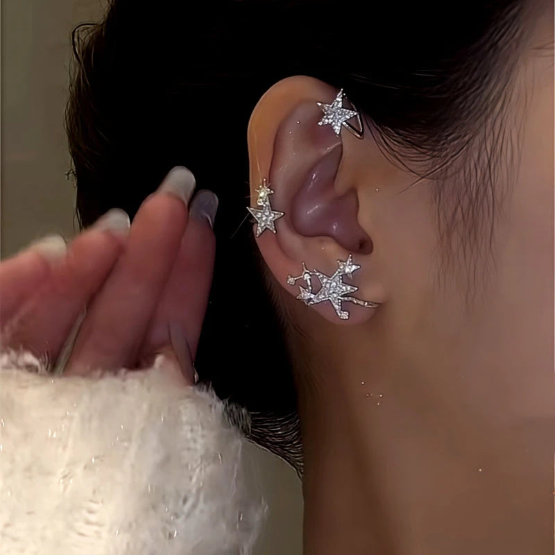 Close-up detail of the sparkling zircons and plating on the Star Ear Cuffs