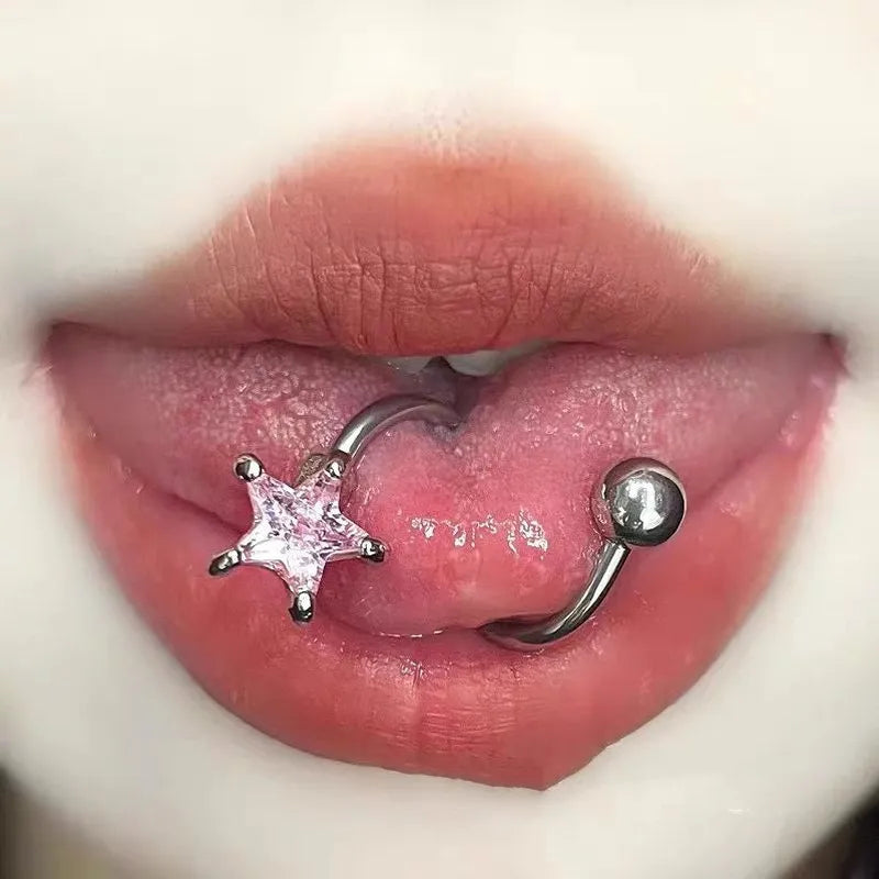 Model showcasing the dangle and style of the 14K Gold-Plated Star Tongue Stud Earrings