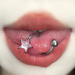 Model showcasing the dangle and style of the 14K Gold-Plated Star Tongue Stud Earrings