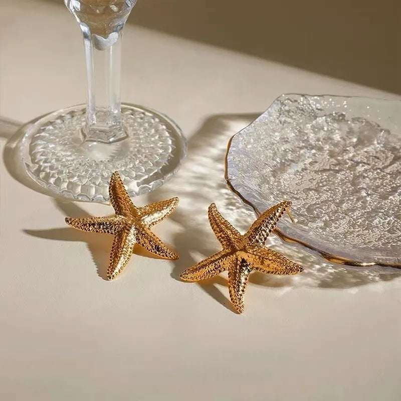 Close-up detail of the sparkling zircons and plating on the Starfish Stud Earrings