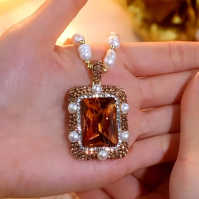 14K Gold-Plated Sugar Cube Pearl Sweater Necklace worn to showcase its length and pendant detail