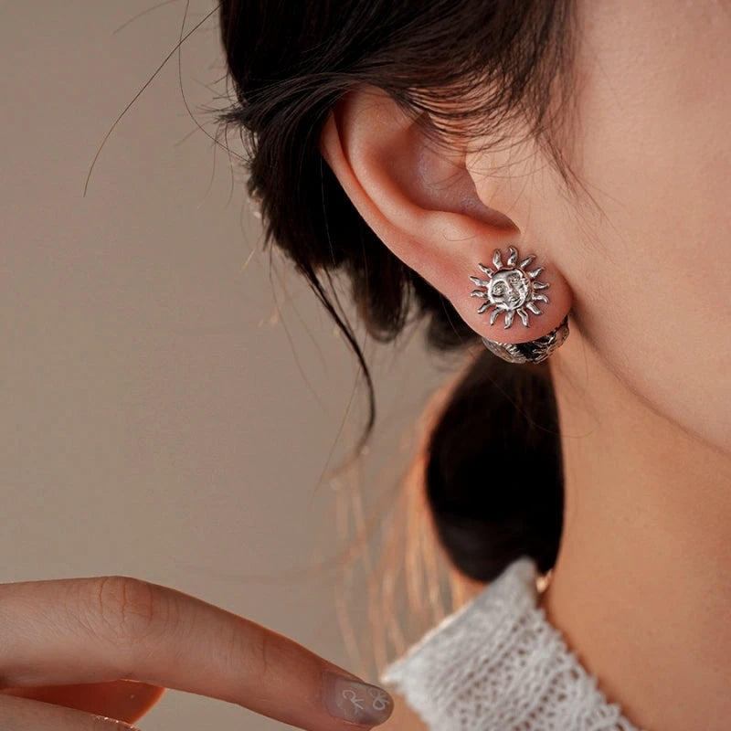 Angled view of the 14K Gold-Plated Sun Jacket Earrings