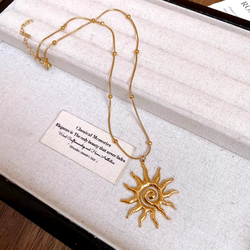 Close-up of the pendant and clasp on the Sun Pendant Necklace