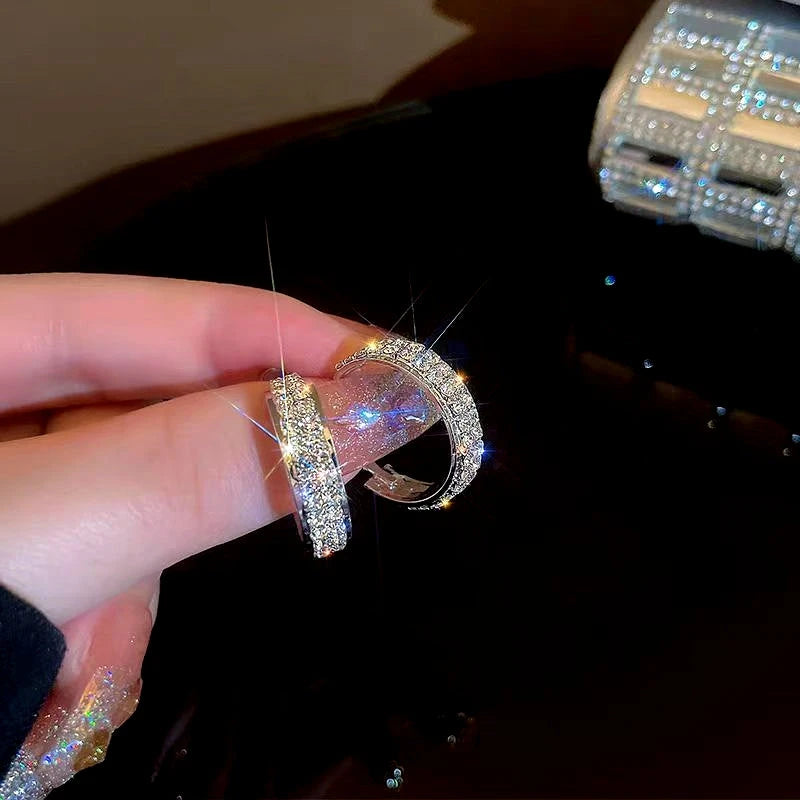 Close-up detail of the sparkling zircons and plating on the Rhinestone Hoop Earrings