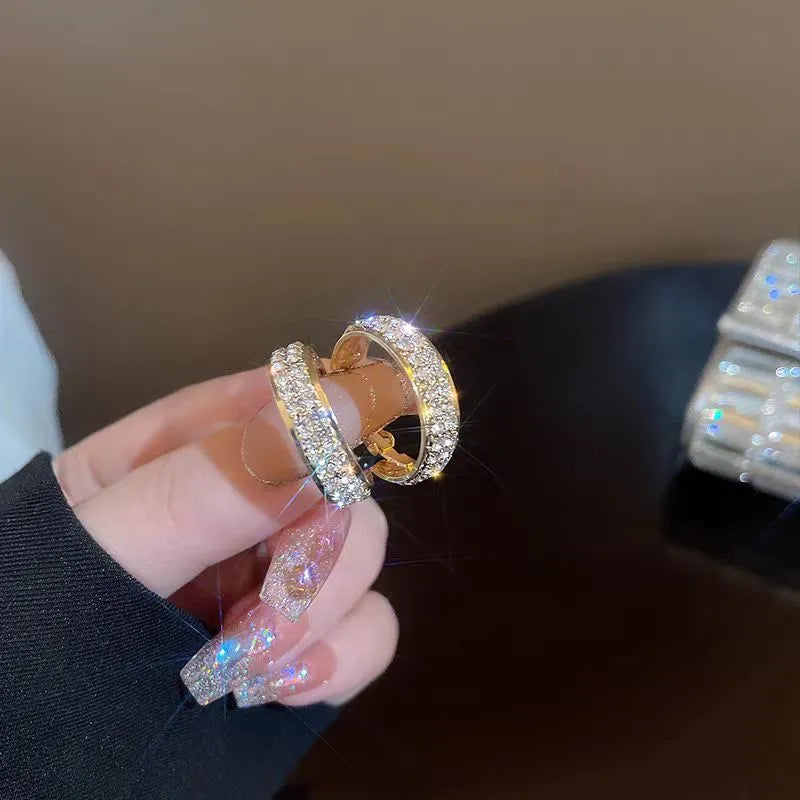 Angled view of the 14K Gold-Plated Super-Shiny Rhinestone Hoop Earrings
