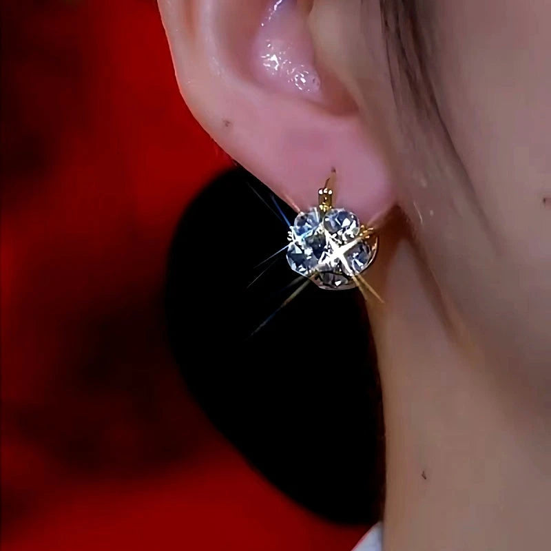 Close-up detail of the sparkling zircons and plating on the Retro Pearl Earrings