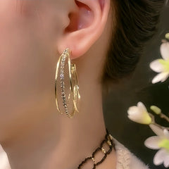 Close-up detail of the sparkling zircons and plating on the Diamond Hoop Earrings