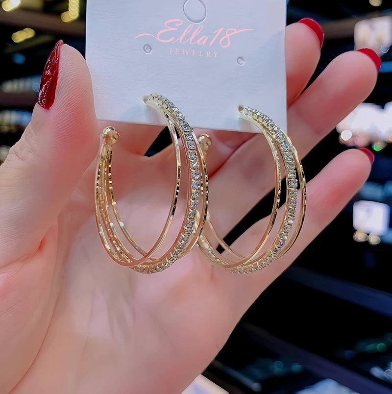 Angled view of the 14K Gold-Plated Three-Layer Diamond Hoop Earrings