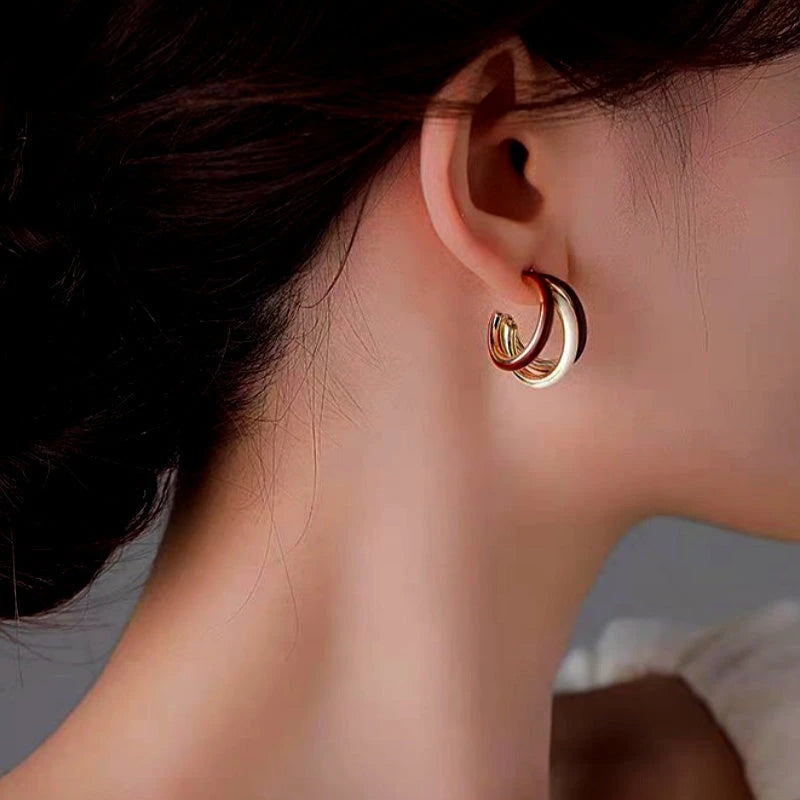 Close-up detail of the sparkling zircons and plating on the Three-Layer Hoops
