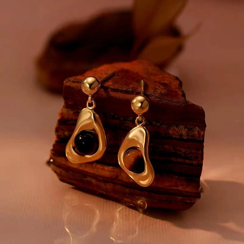 Angled view of the 14K Gold-Plated Tiger Eye Stone Earrings