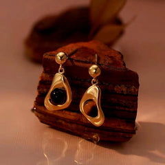 Angled view of the 14K Gold-Plated Tiger Eye Stone Earrings