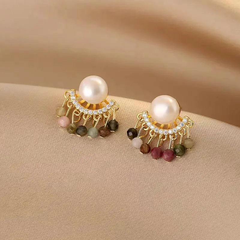 Angled view of the 14K Gold-Plated Tourmaline Pearl Earrings