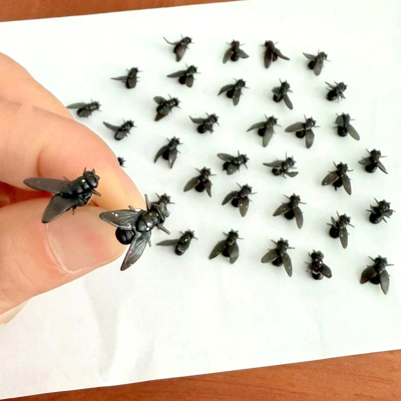Close-up detail of the sparkling zircons and plating on the Insect Stud Earrings