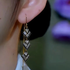 Close-up detail of the sparkling zircons and plating on the Black and White Threaders