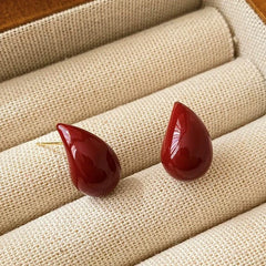 Angled view of the 14K Gold-Plated Water Drop Stud Earrings
