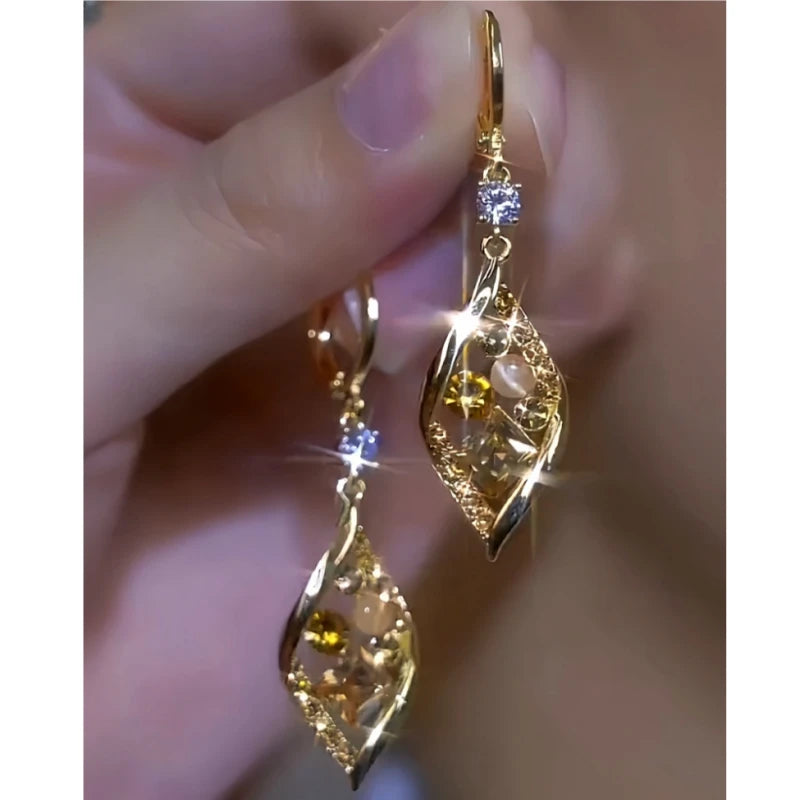Close-up detail of the sparkling zircons and plating on the Cat's Eye Earrings