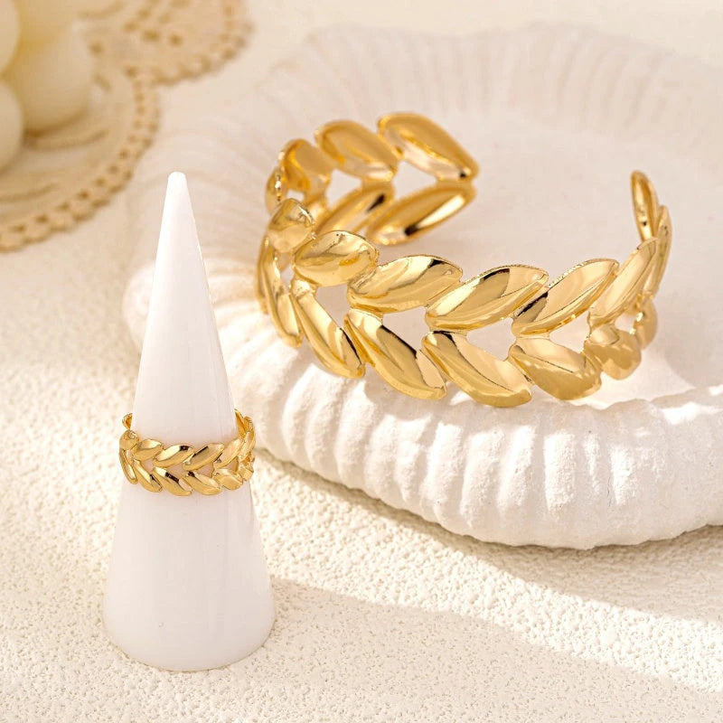Close-up of the clasp and charm details on the Wheat Bracelet and Ring Set