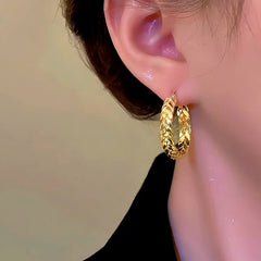 Close-up detail of the sparkling zircons and plating on the Wheat Hoop Earrings