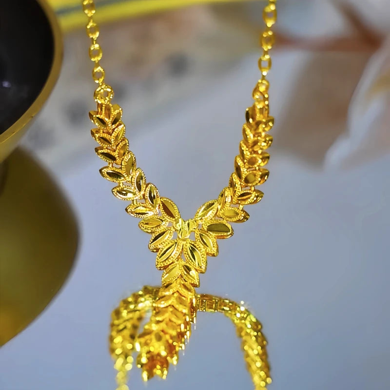 Close-up of the pendant and clasp on the Wheat Necklace