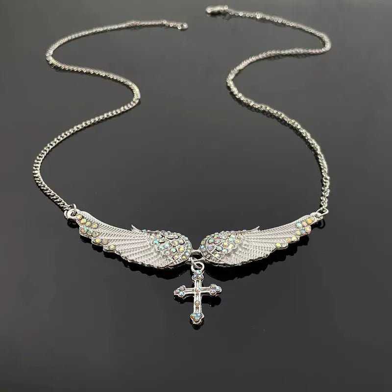 Styling the 14K Gold-Plated Zircon Angel Wing Cross Tassel Necklace with a beautiful outfit