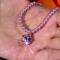 Detailed view of the 14K Gold-Plated Zircon Ball Pearl Necklace chain and pendant