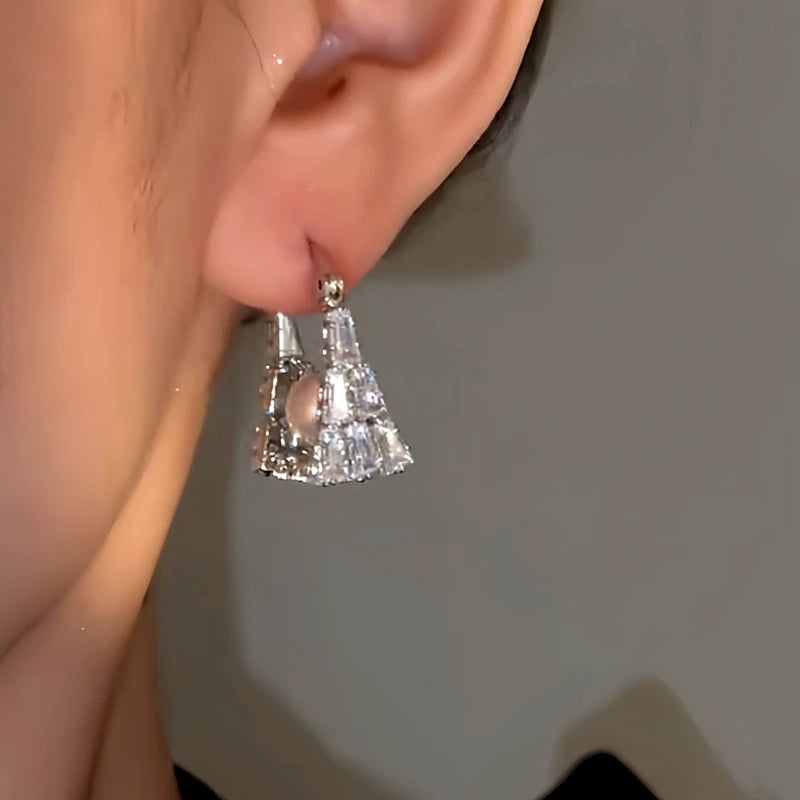 Close-up detail of the sparkling zircons and plating on the Handbag Earrings
