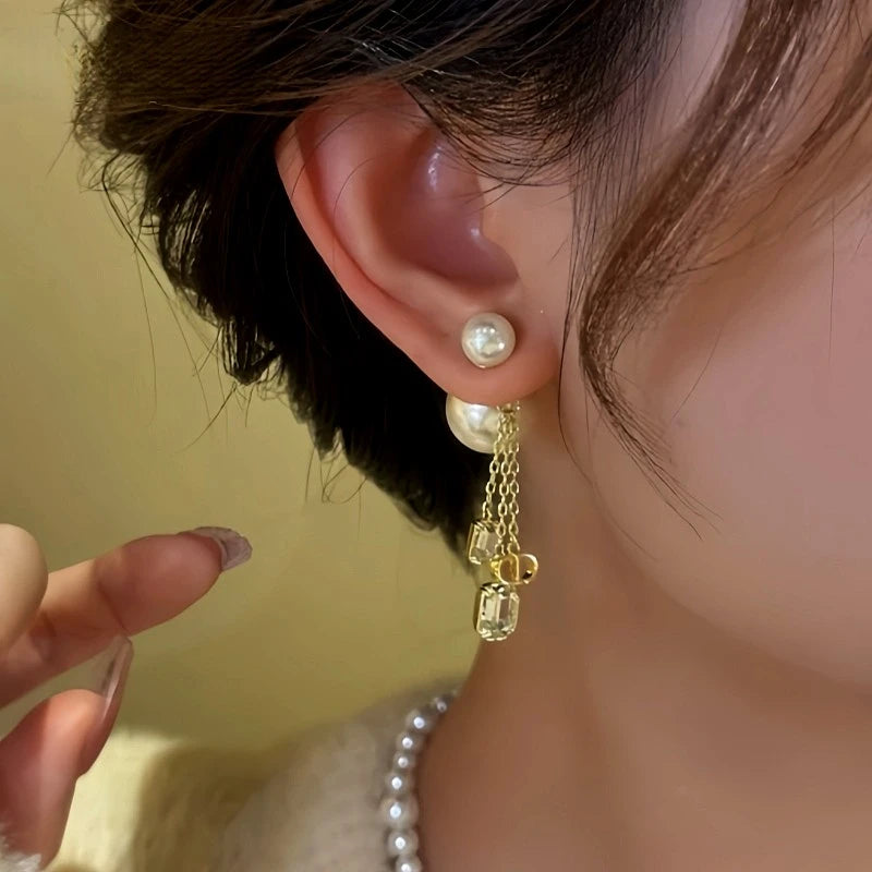 Close-up detail of the sparkling zircons and plating on the Bead Tassel Earrings