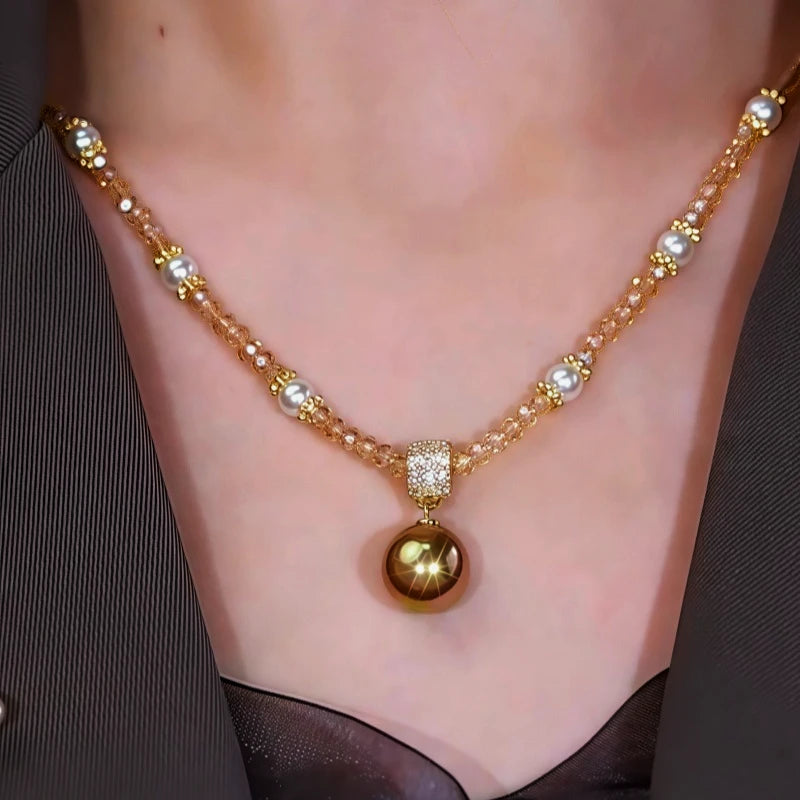 14K Gold-Plated Zircon Beads Brown Pearl Necklace worn to showcase its length and pendant detail