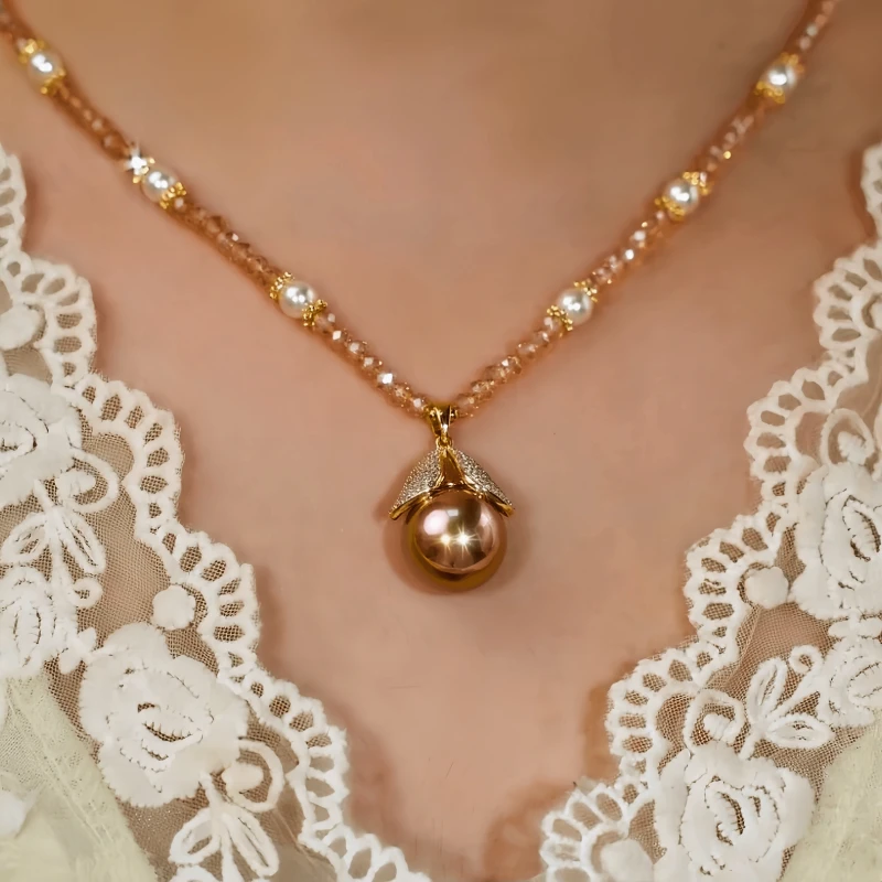 14K Gold-Plated Zircon Beads Leaf Necklace worn to showcase its length and pendant detail