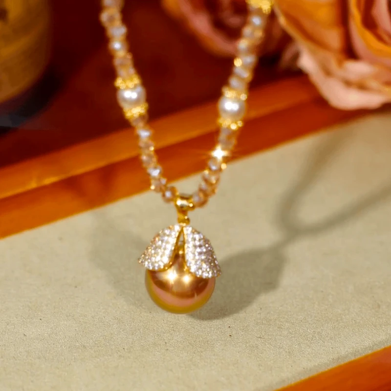 Detailed view of the 14K Gold-Plated Zircon Beads Leaf Necklace chain and pendant
