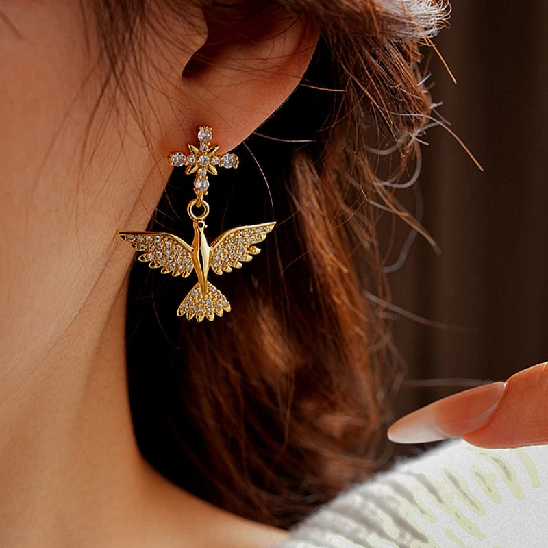 Close-up detail of the sparkling zircons and plating on the Zircon Bird Earrings