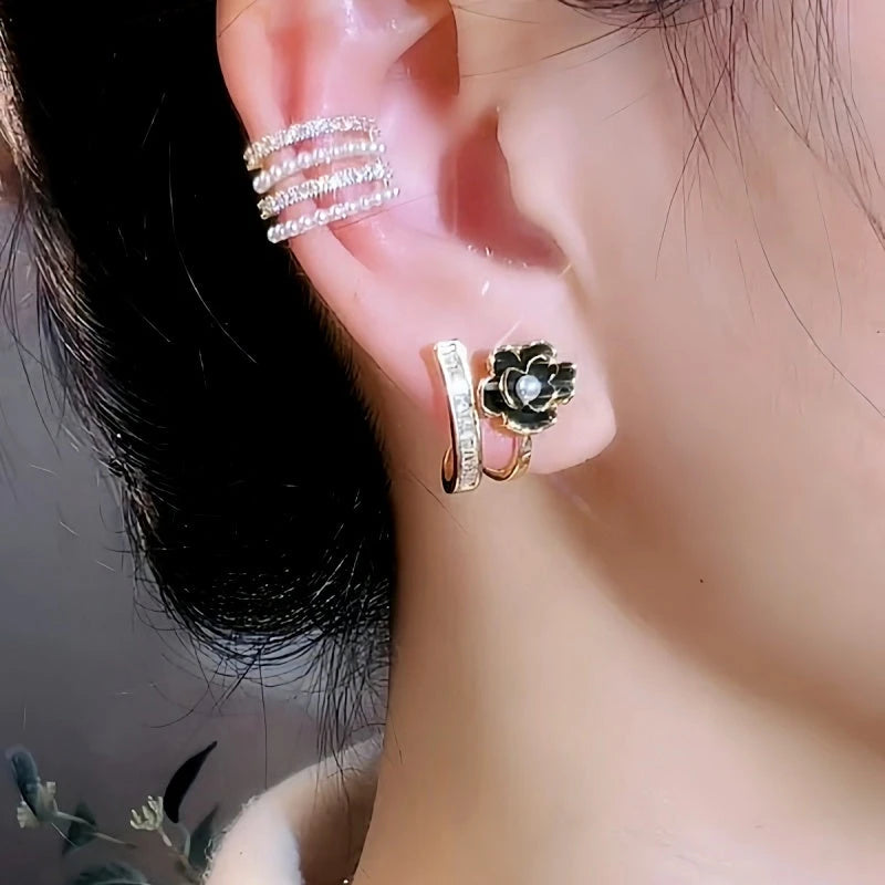 Close-up detail of the sparkling zircons and plating on the Black Rose Studs