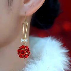 Model showcasing the dangle and style of the 14K Gold-Plated Zircon Bow Rose Ear Hooks