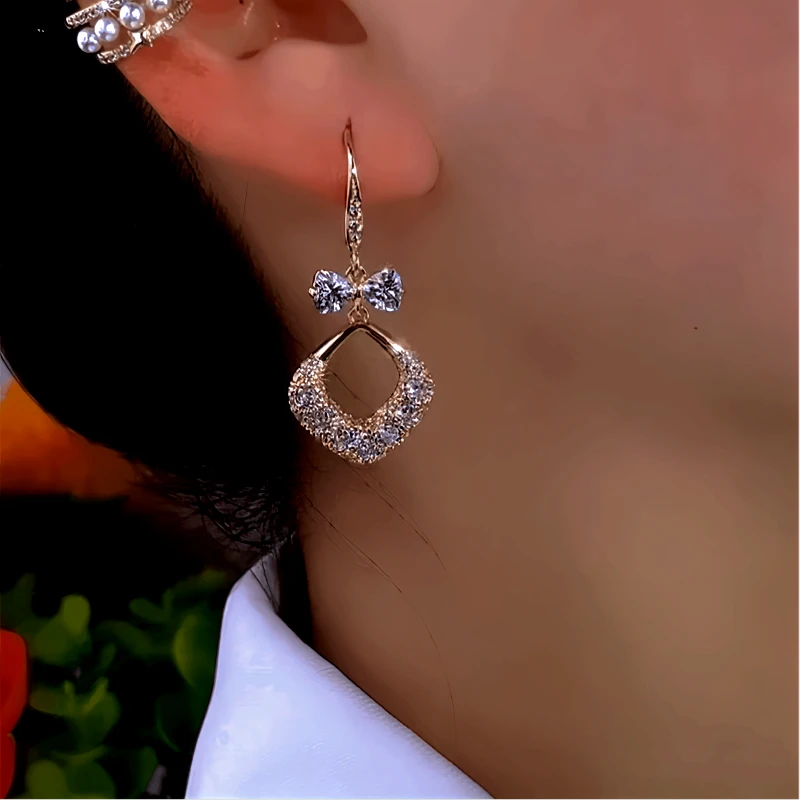 Close-up detail of the sparkling zircons and plating on the Water Drop Ear Hooks