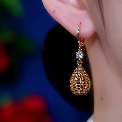 Close-up detail of the sparkling zircons and plating on the Water Drop Earrings