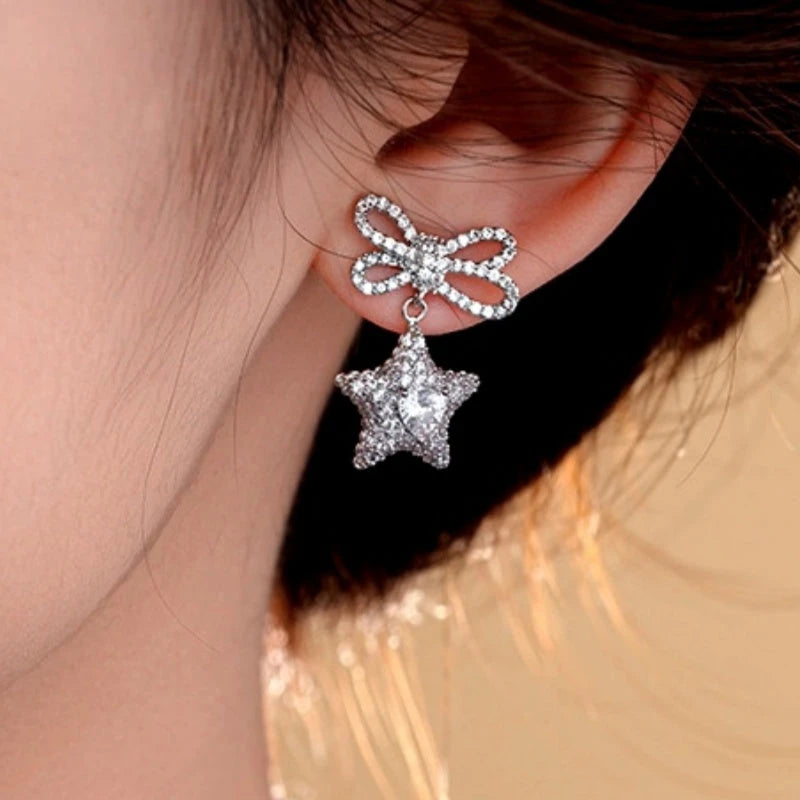Close-up detail of the sparkling zircons and plating on the Asymmetrical Earrings
