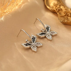 Angled view of the 14K Gold-Plated Zircon Butterfly Earrings