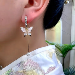 Close-up detail of the sparkling zircons and plating on the Pink Butterfly Earrings